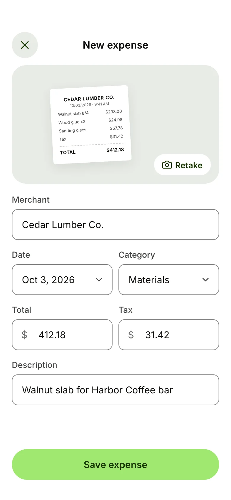 A new expense from a photographed Cedar Lumber Co. receipt for $412.18